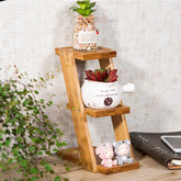 Modern bamboo mini shelf with succulents and cute figurines, minimalist desk decor