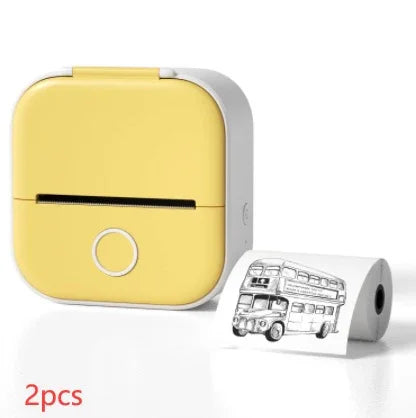 Compact yellow and white portable label printer with printed paper roll, modern tech accessory.