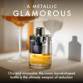 Azzaro Wanted Eau de Toilette men’s fragrance metallic barrel-shaped bottle with woody, citrus, and spicy notes