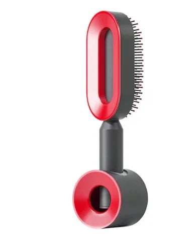 Red and black futuristic hair styling brush with sleek plastic finish and built-in dryer