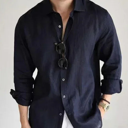 Men's relaxed fit black linen button-up shirt with rolled sleeves, casual style