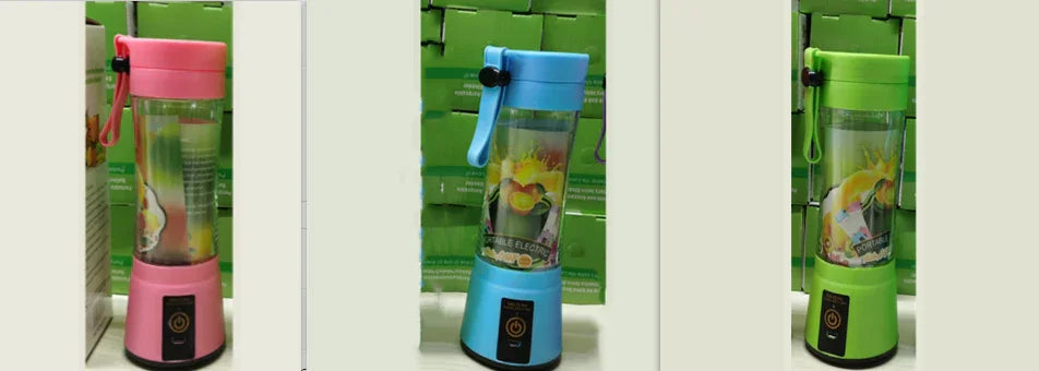Assorted stylish pink, blue, and green portable blender bottles with transparent body
