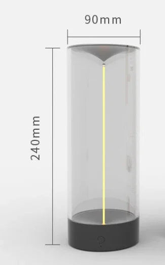 Modern cylindrical LED lamp with transparent body, black base, 240mm height, 90mm diameter.