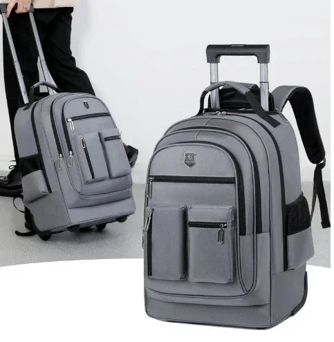 Gray rolling backpack with multiple zippered compartments, durable fabric, adjustable straps, casual fit