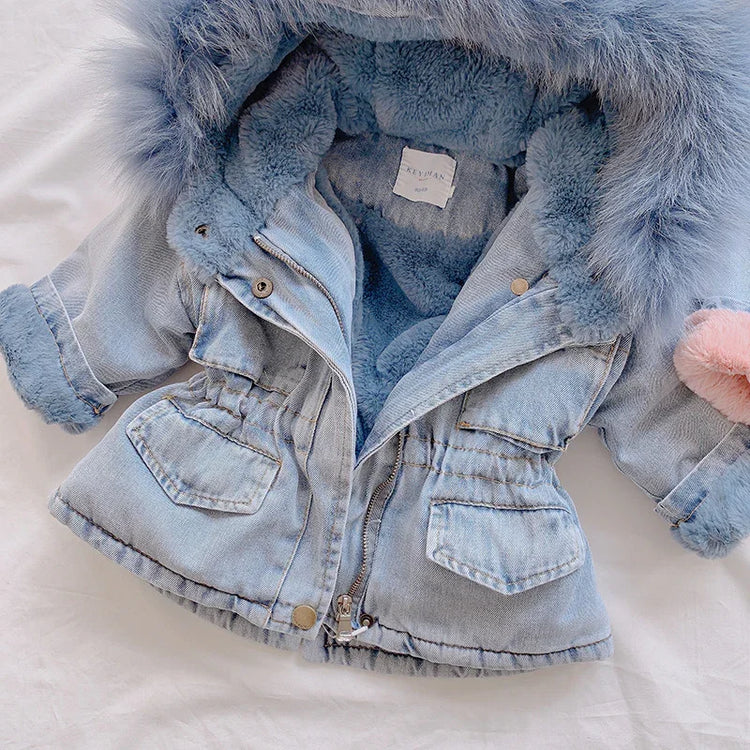 Light blue denim jacket with faux fur lining, fluffy hood, relaxed fit, and front pockets