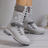 Light gray lace-up winter boots with chunky sole, knit cuffs, and side buckle detail