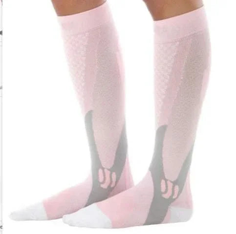 Knee-high light pink compression socks with black and white accents, stretchy fit, breathable fabric