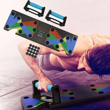 Man using a multi-color push up board system for bodyweight exercise on gym floor