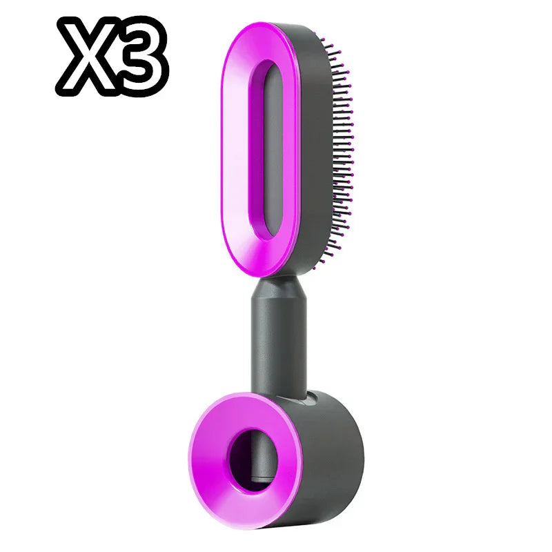 Sleek black and pink futuristic hair brush with ventilated design and ergonomic handle