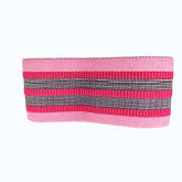 Wide pink and black striped knit headband with ribbed texture and stretchy fabric.