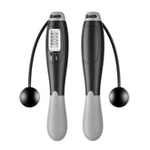 Black and gray cordless digital jump rope with weighted handles and LCD counter display