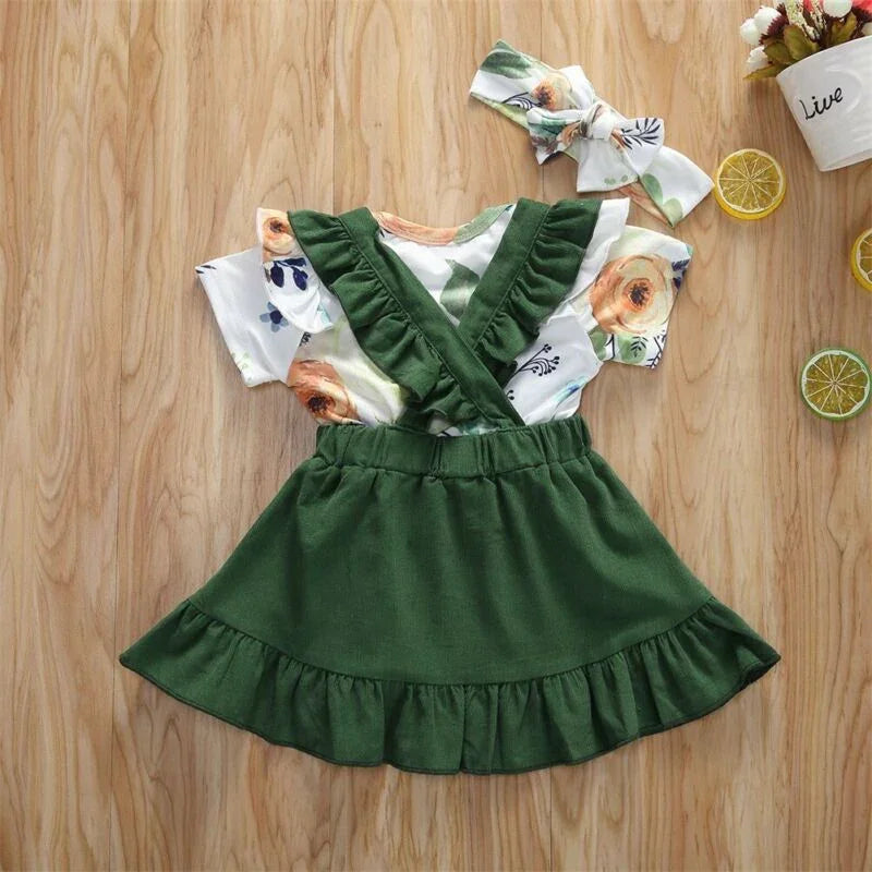 Green ruffle suspender skirt with floral print short-sleeve top and matching headband for kids