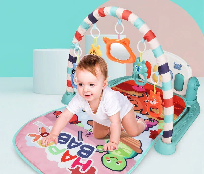 Baby in white bodysuit crawling on colorful play mat with hanging plush toys, short sleeves, soft fit