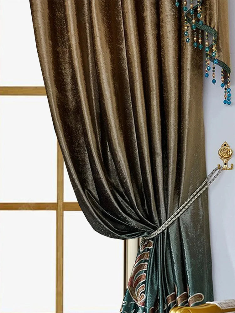 Brown velvet curtain with teal beaded trim, draped and tied back for a luxurious fit