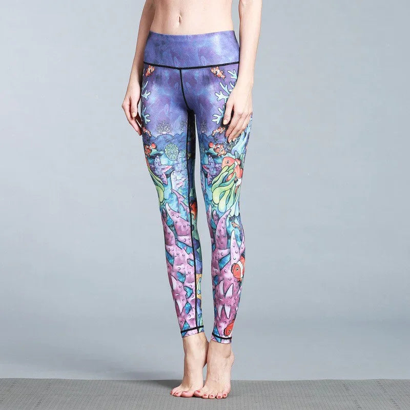High-waisted purple leggings with colorful underwater print, slim fit, stretchy fabric