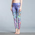 High-waisted purple leggings with colorful underwater print, slim fit, stretchy fabric