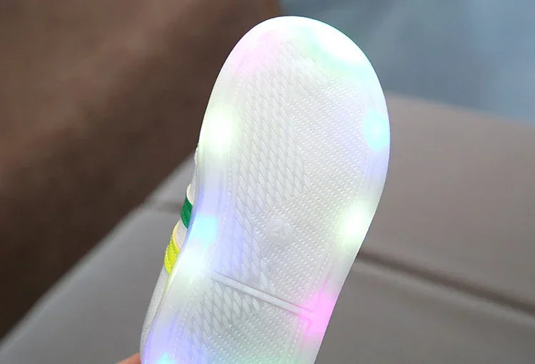 White sneaker with textured sole and colorful LED lights, casual streetwear style