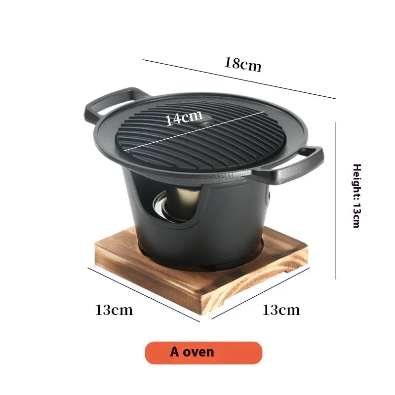 Compact black cast iron tabletop grill with wooden base, round ridged top, dimensions labeled.