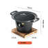 Compact black cast iron tabletop grill with wooden base, round ridged top, dimensions labeled.
