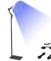 Adjustable black floor lamp emitting blue LED light, shown with cables and protective eyewear.
