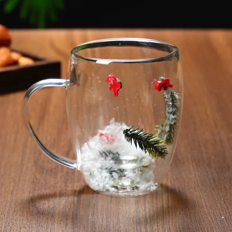 Clear glass mug with Christmas tree, snow, and red holiday accents, double-walled design