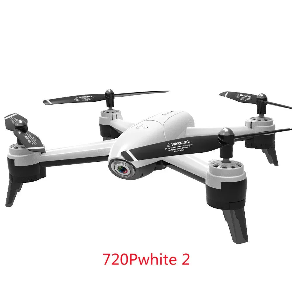 White and black quadcopter drone with camera, modern design, foldable legs