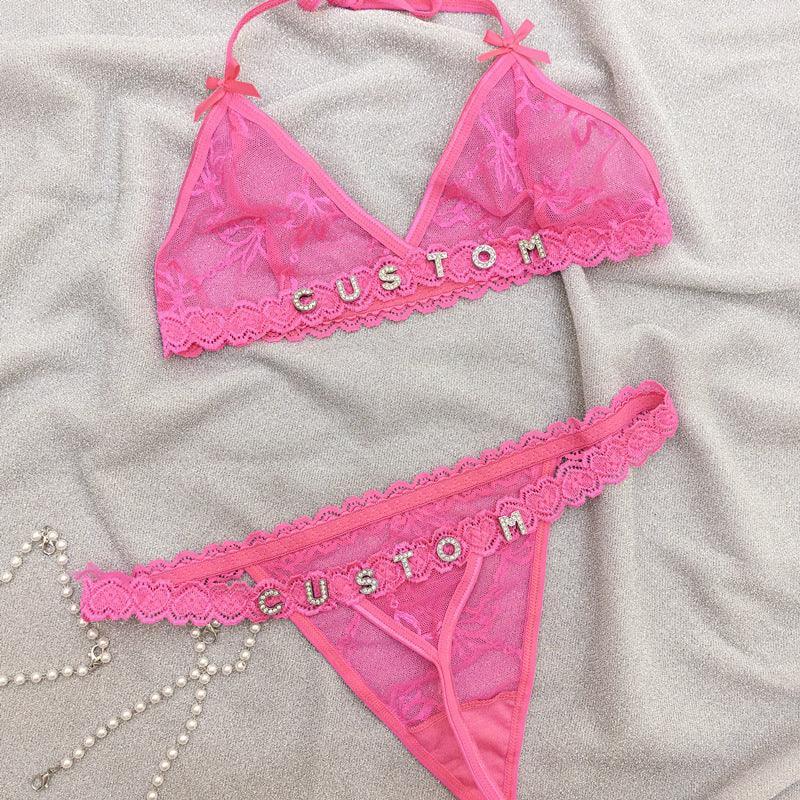 Pink lace bralette and thong lingerie set with mesh material and custom letter detailing