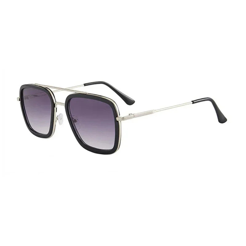Square oversized sunglasses with black frames, silver metal arms, and gradient dark lenses