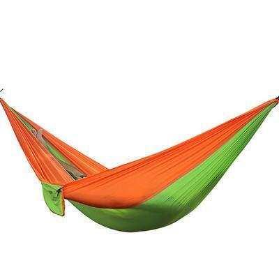 Orange and green nylon hammock with a colorblock design, lightweight and portable
