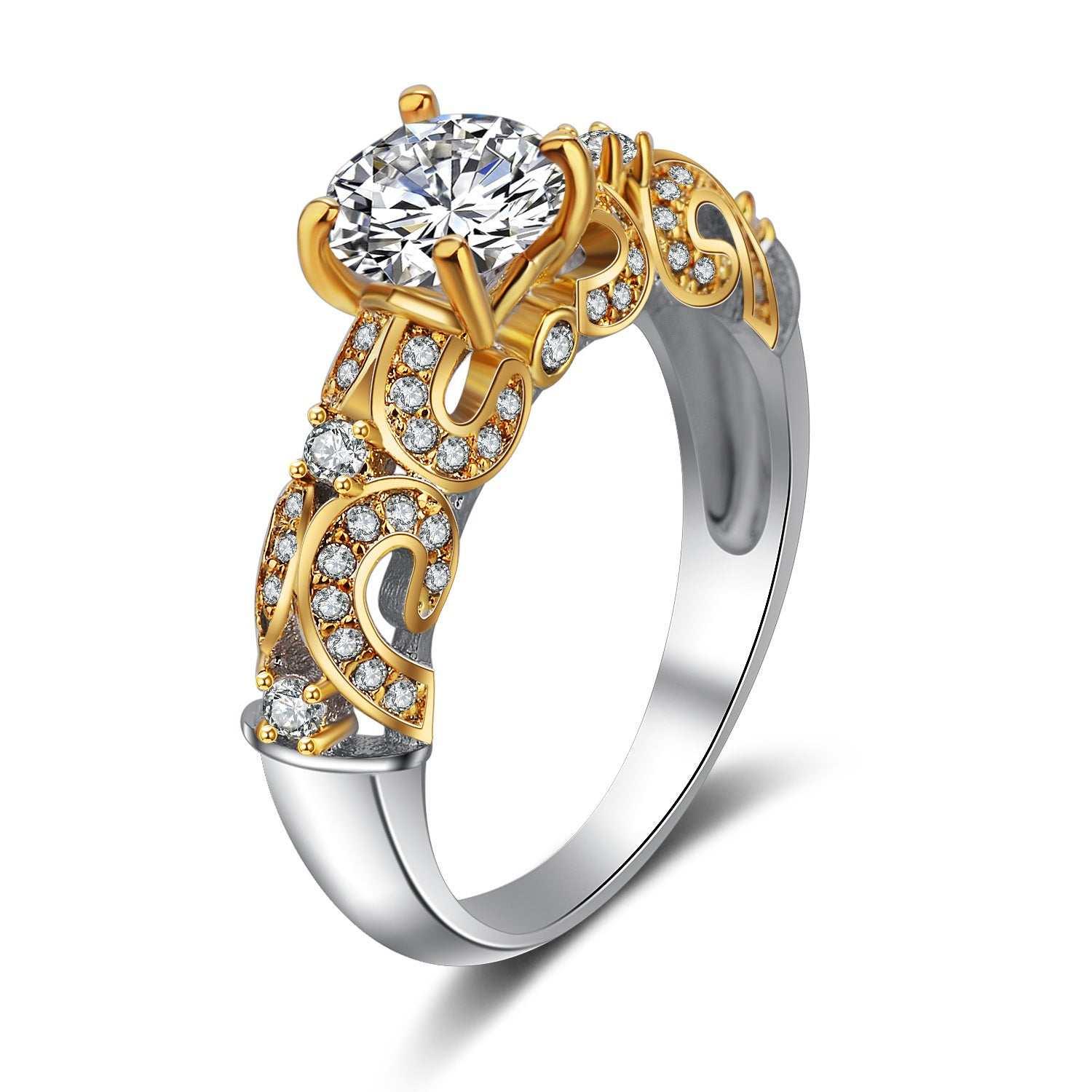 Gold and silver ornate engagement ring with clear round gemstones and intricate filigree design.