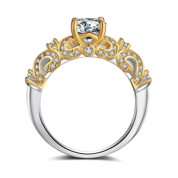 Two-tone gold and silver ornate ring with pavé crystals and a raised solitaire centerpiece
