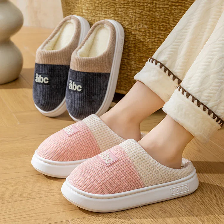 Cozy slip-on slippers in pink and beige, ribbed fabric, plush lining, casual indoor footwear
