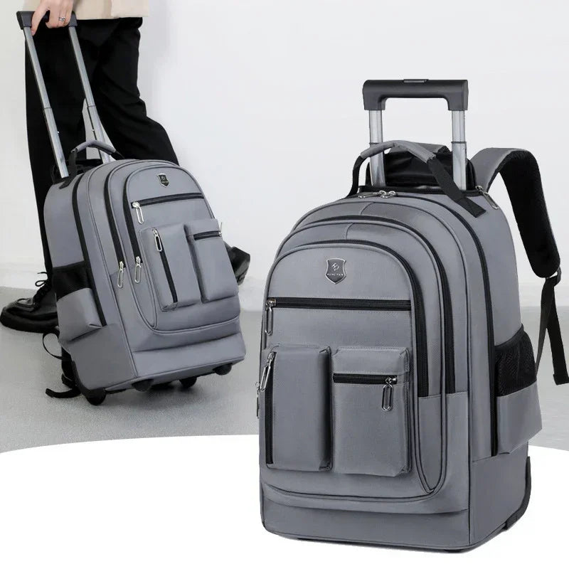 Gray rolling backpack with multiple zippered pockets, durable material, ergonomic design