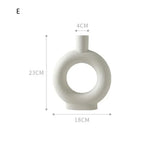 Round white ceramic vase with central hole, matte finish, 23cm tall, minimalist style