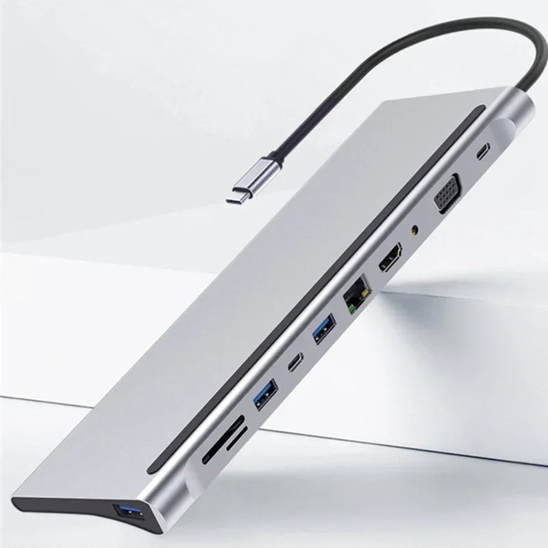 Slim silver USB-C multiport hub with HDMI, Ethernet, USB, and card reader ports