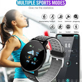 Woman in blue sports top running, featuring a black and gray smart fitness watch with perforated band and digital display.