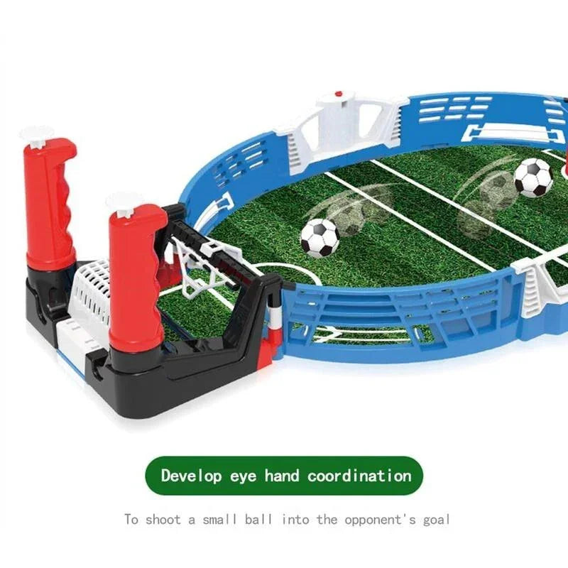 Mini tabletop soccer game with green field, two goals, and small soccer balls.