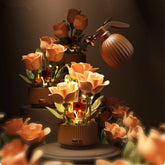 Artificial orange rose bouquet with green leaves in a round ribbed vase, warm lighting