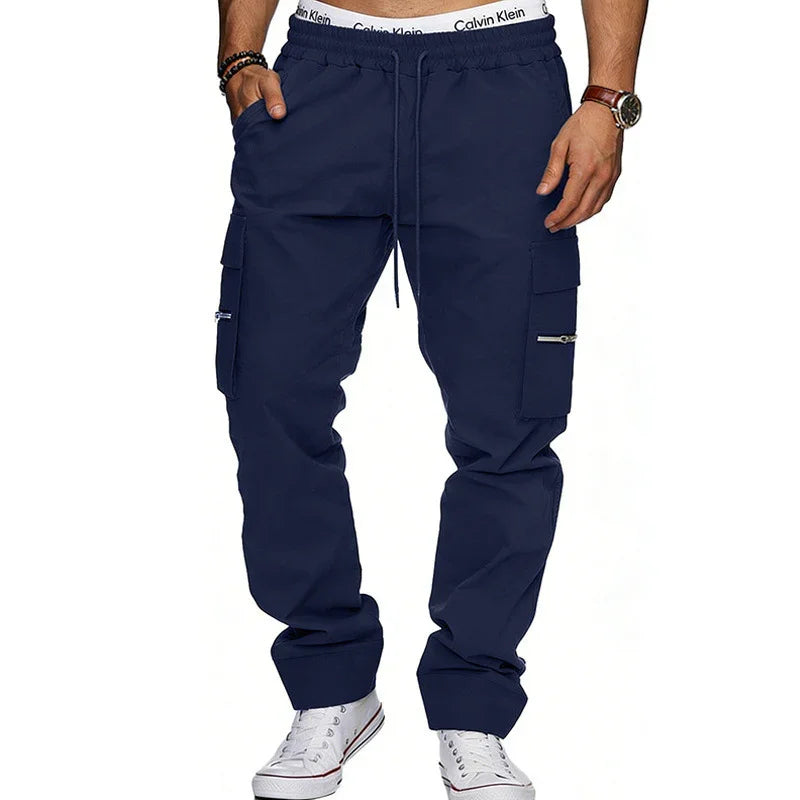 Men’s navy blue cargo jogger pants with side pockets and drawstring waist, relaxed fit