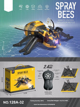 Yellow and black remote control robotic insect toy with wireless controller and spray feature.