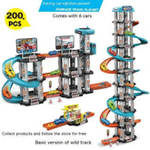 Colorful toy multi-level racing car track set with spiral ramps and six small cars.