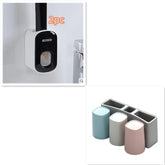 Modern bathroom accessories set featuring a wall-mounted black and white holder and a pastel-colored toothbrush cup organizer.