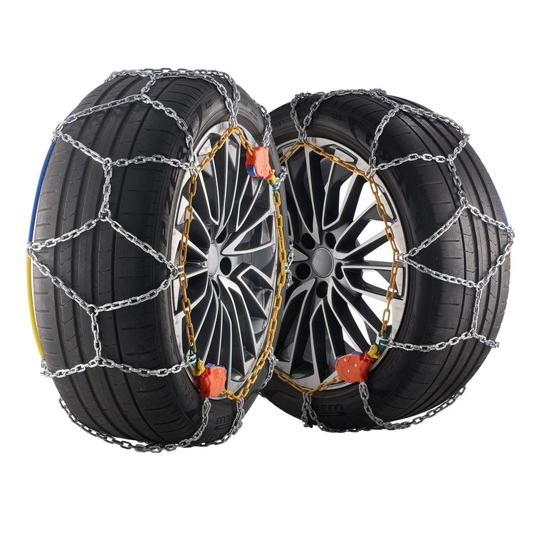 Two black car tires with silver rims fitted with metal snow chains for winter traction.