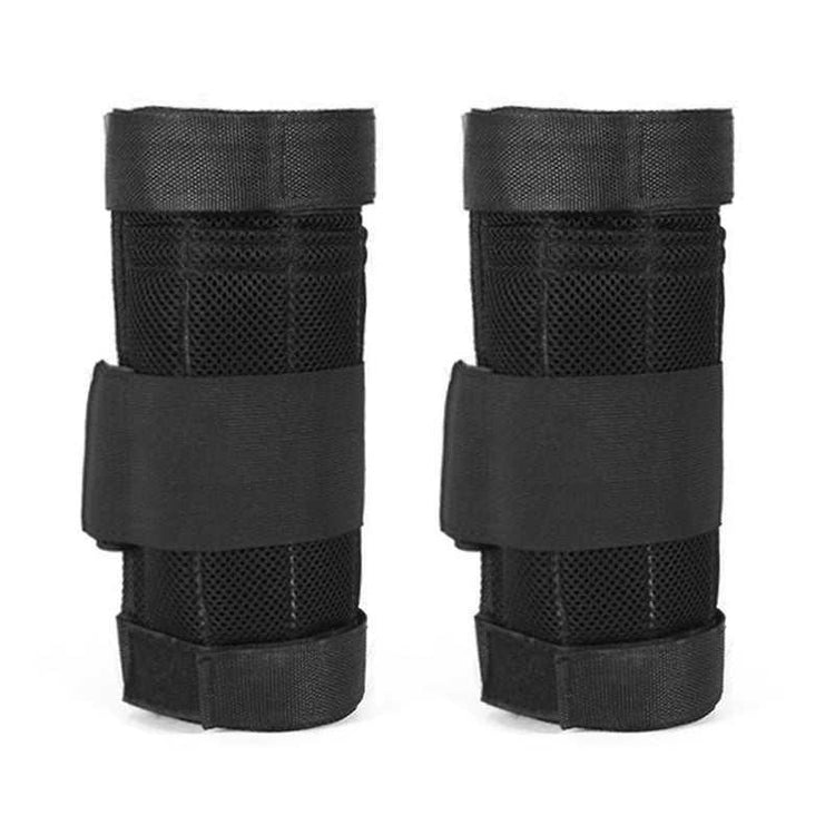 Pair of black mesh wrist guards with adjustable straps, breathable material, unisex fit.