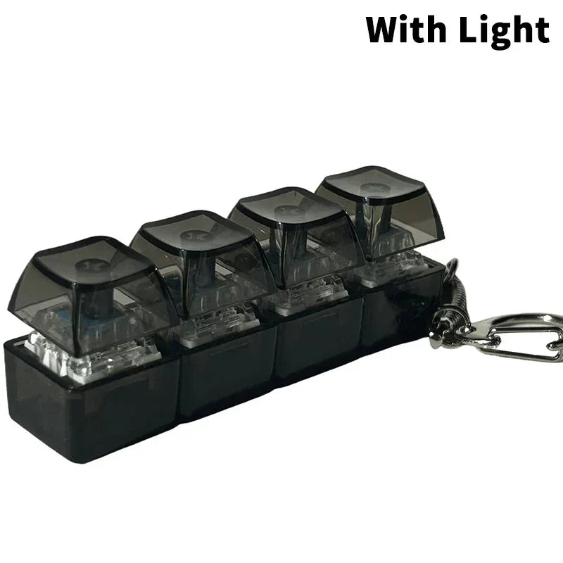 Mini black mechanical keychain with four translucent keys and LED light feature