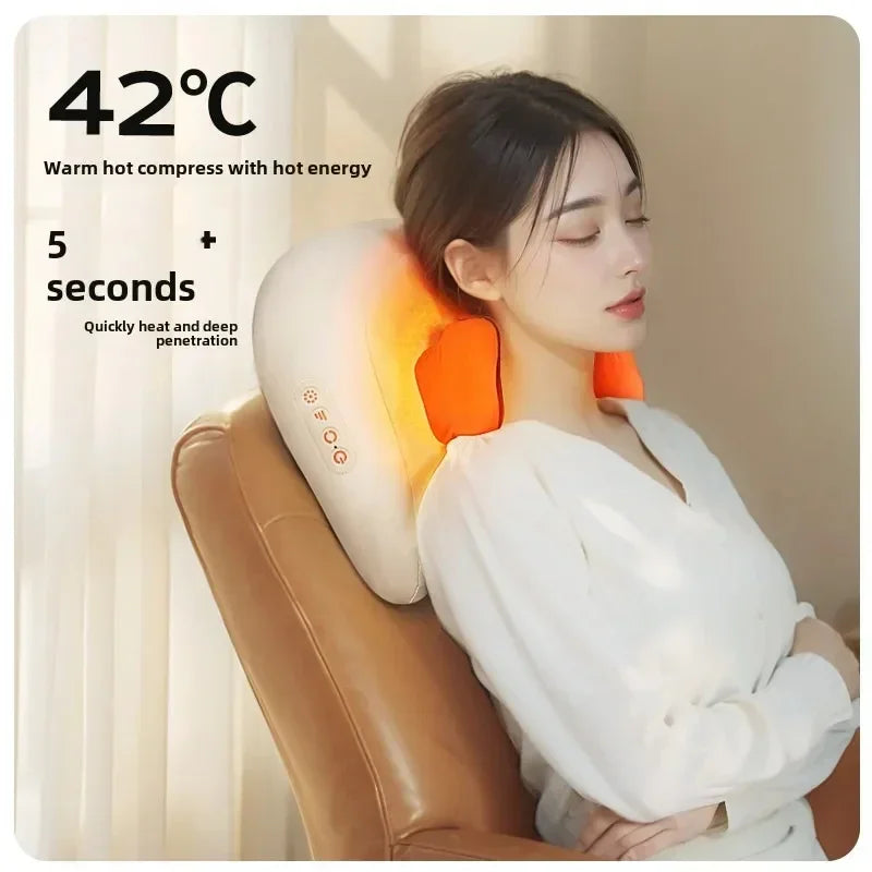 Woman in a white, loose-fit blouse relaxing with a heated neck massager, minimal modern style.