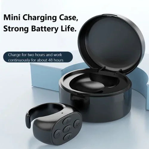 Black smart ring with control buttons and mini charging case, futuristic tech accessory