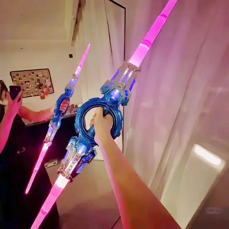 Person holding a futuristic blue plastic weapon with glowing pink LED blades indoors