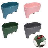 Set of four plastic double-layer drain bowls in blue, pink, green, and gray, used for washing produce.