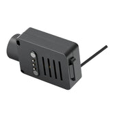 Black rectangular tech accessory with vents and magnetic connector, modern matte finish